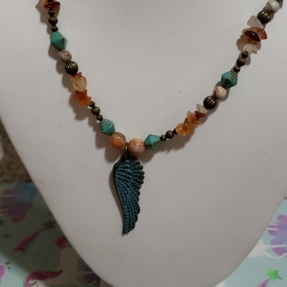Hand made necklace with antique style wing. - Picture 2 of 5